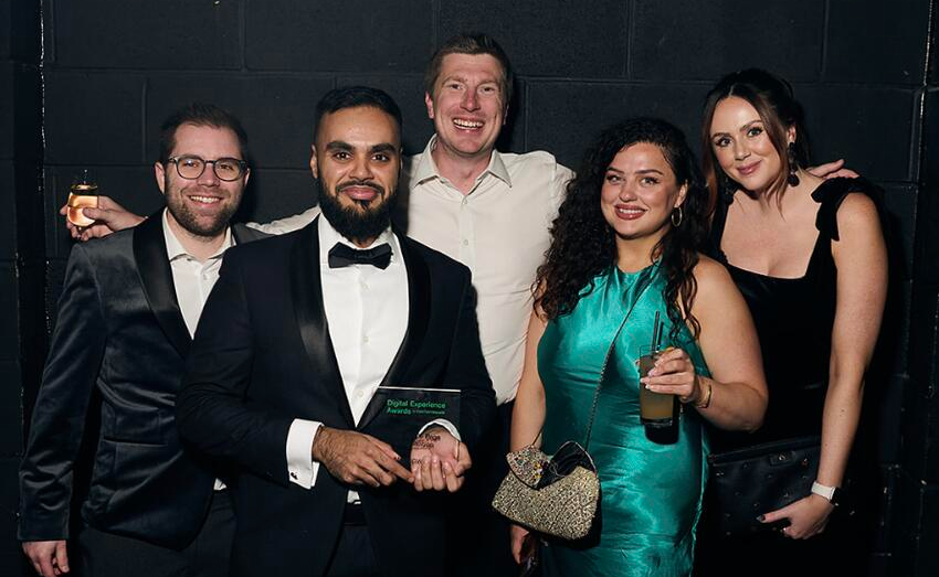 Ami receiving the CX Award